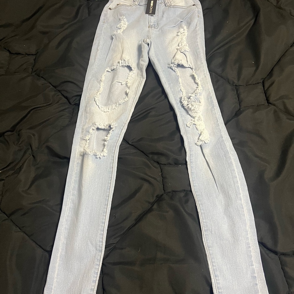 Fashion Nova Light Blue Distressed Skinny Jeans